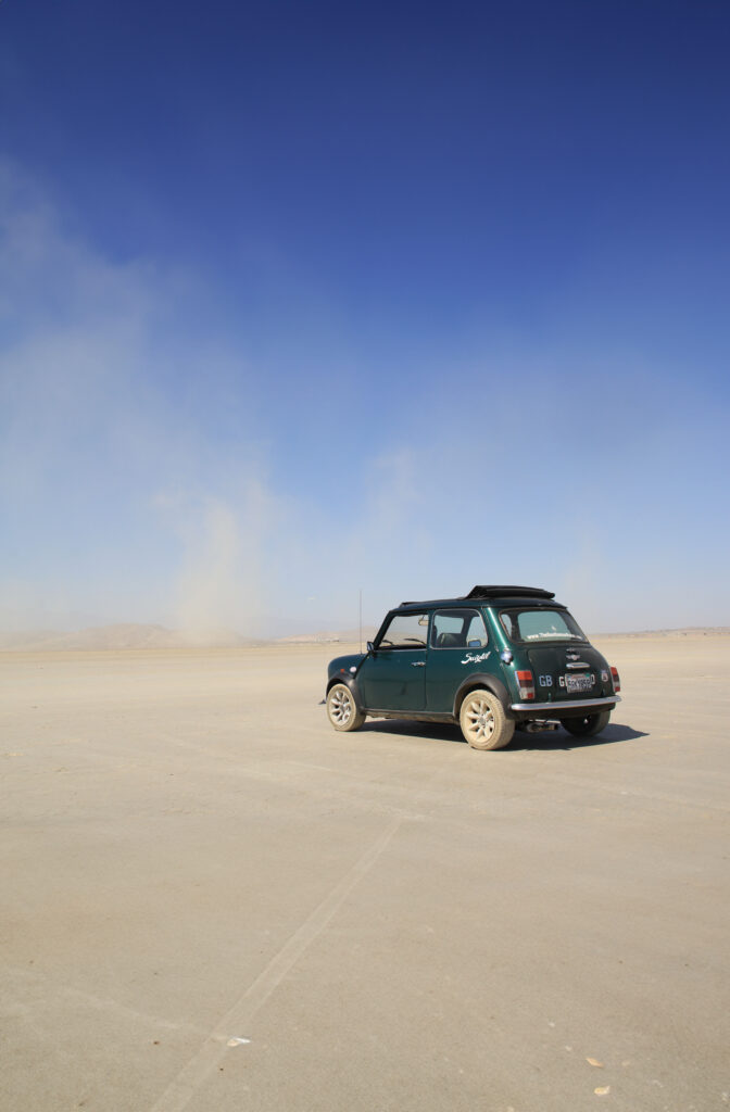 Mini Cooper a car parked in a desert