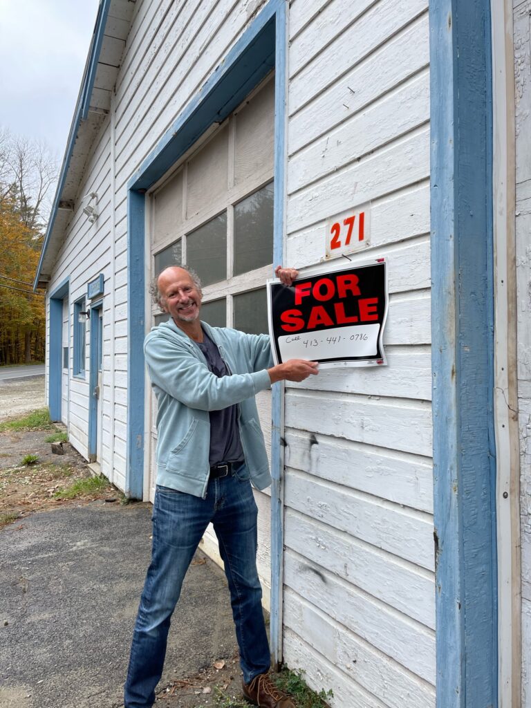 Dave Hattem And Gallerie 271 taking the for sale sign down.