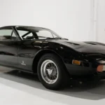 Once owned by Sylvester Stallone, this rare 1972 Ferrari 365 GTC/4 Coupe is a stunning blend of Hollywood glamour and Italian performance. Now offered by Daniel Schmitt & Co., this triple black, low-mileage classic is a must-see for serious collectors.