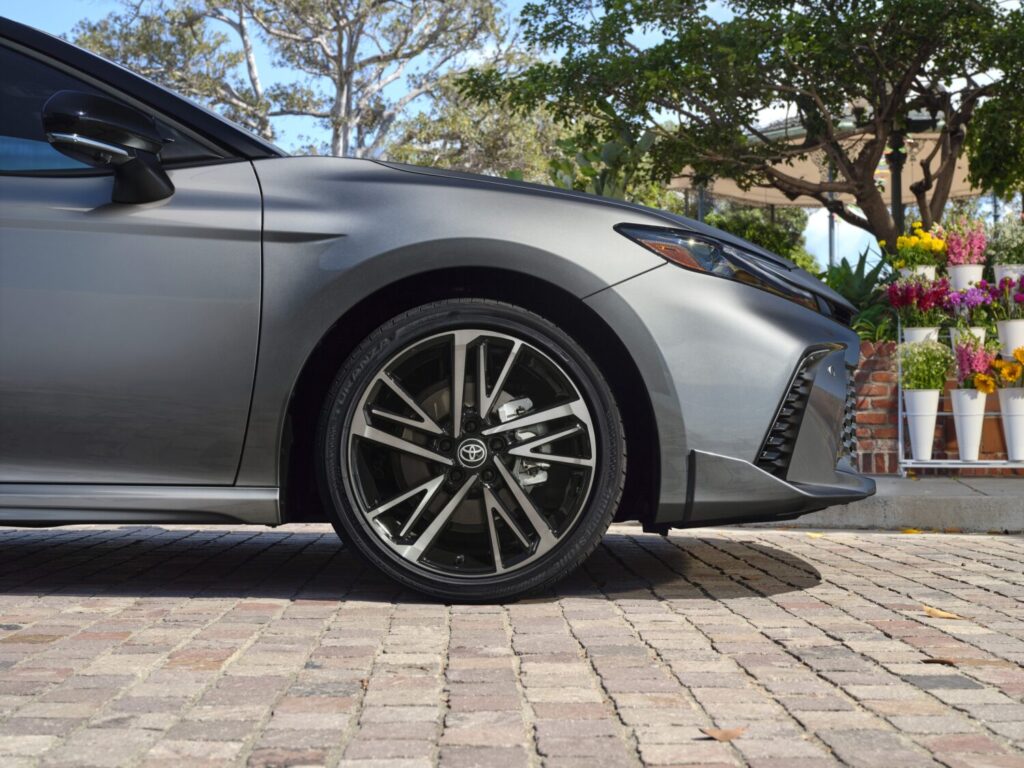 The Toyota Camry has long been a staple of suburban streets and business casual commutes. Reliable, efficient, and classically conservative, it’s the kind of car that never makes waves. But the 2025 Camry XSE might be the best version of the venerable sedan yet. With bold styling, sharper handling, and a hint of sport sedan flair, all while maintaining the DNA that’s made the Camry a household name for decades.