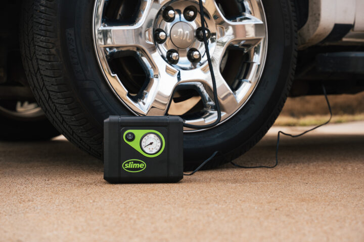 The Slime Tire Inflator is designed exactly for that purpose. Small enough to store in your vehicle yet powerful enough to inflate a full size tire, it is meant to solve one of the most common roadside problems without needing a tow truck or a trip to the gas station.