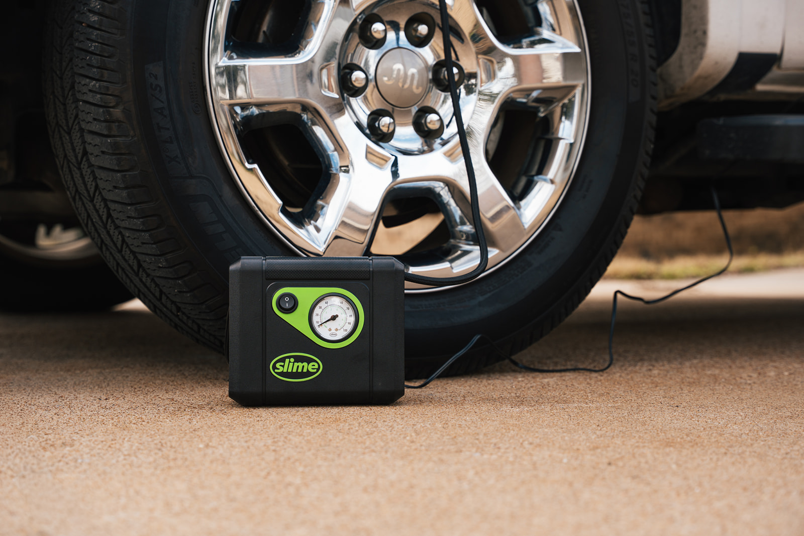 The Slime Tire Inflator is designed exactly for that purpose. Small enough to store in your vehicle yet powerful enough to inflate a full size tire, it is meant to solve one of the most common roadside problems without needing a tow truck or a trip to the gas station.
