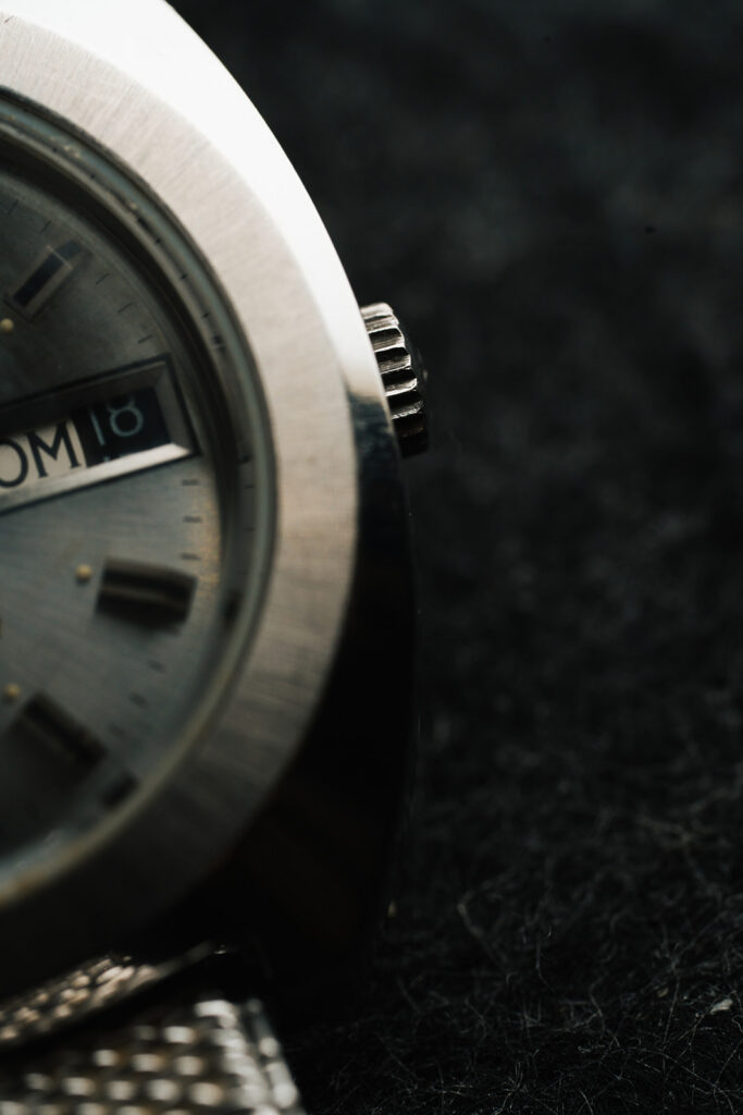 1970s Duward Automatic 100M Internat stainless steel watch with silver dial and Spanish day wheel