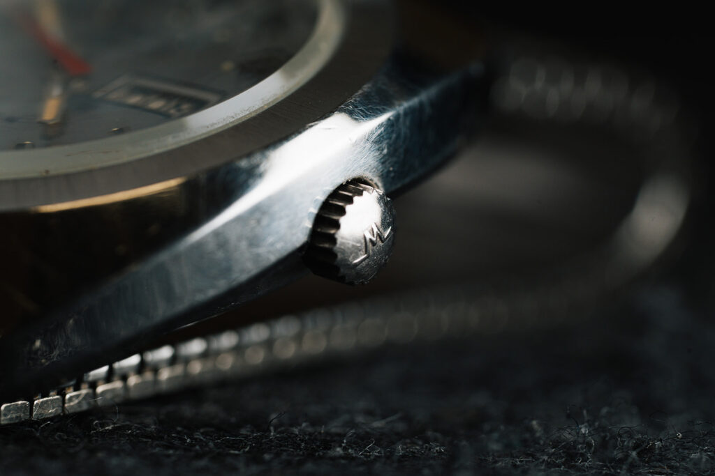 1970s Duward Automatic 100M Internat stainless steel watch with silver dial and Spanish day wheel