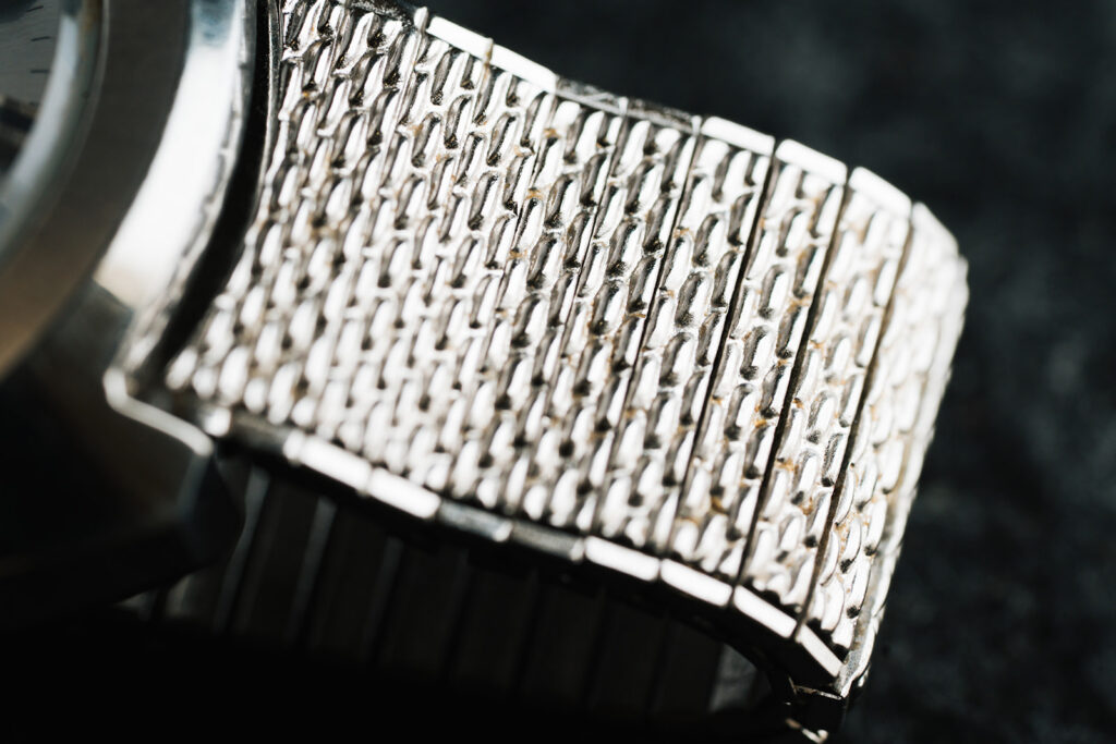 1970s Duward Automatic 100M Internat stainless steel watch with silver dial and Spanish day wheel