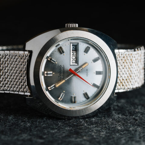 1970s Duward Automatic 100M Internat stainless steel watch with silver dial and Spanish day wheel