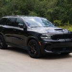 The 2026 Dodge Durango R/T 392 Blacktop combines a 475-horsepower HEMI V8, three-row seating, AWD, and 8,700 pounds of towing capacity.