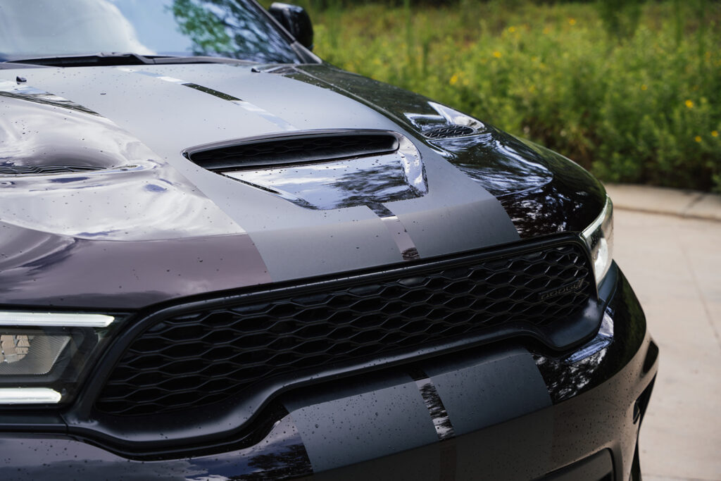The 2026 Dodge Durango R/T 392 Blacktop combines a 475-horsepower HEMI V8, three-row seating, AWD, and 8,700 pounds of towing capacity.