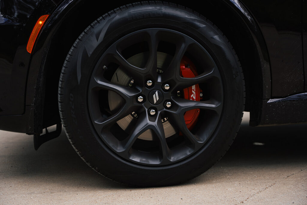 The 2026 Dodge Durango R/T 392 Blacktop combines a 475-horsepower HEMI V8, three-row seating, AWD, and 8,700 pounds of towing capacity.