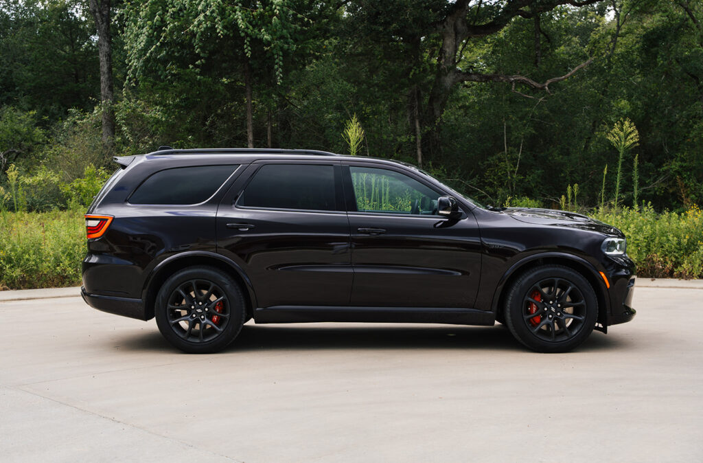 The 2026 Dodge Durango R/T 392 Blacktop combines a 475-horsepower HEMI V8, three-row seating, AWD, and 8,700 pounds of towing capacity.