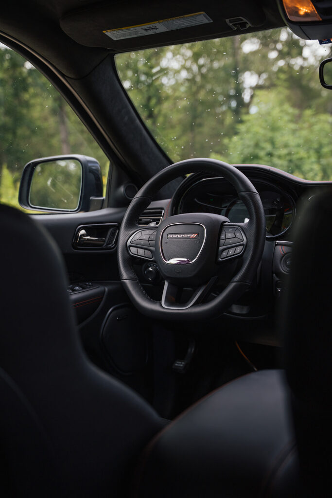 The 2026 Dodge Durango R/T 392 Blacktop combines a 475-horsepower HEMI V8, three-row seating, AWD, and 8,700 pounds of towing capacity.