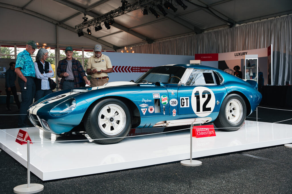 Carroll Shelby's own 1964 Cobra Daytona Coupe, CSX2300, sold for approximately $39 million at Pebble Beach, becoming the most expensive American car ever sold at auction.