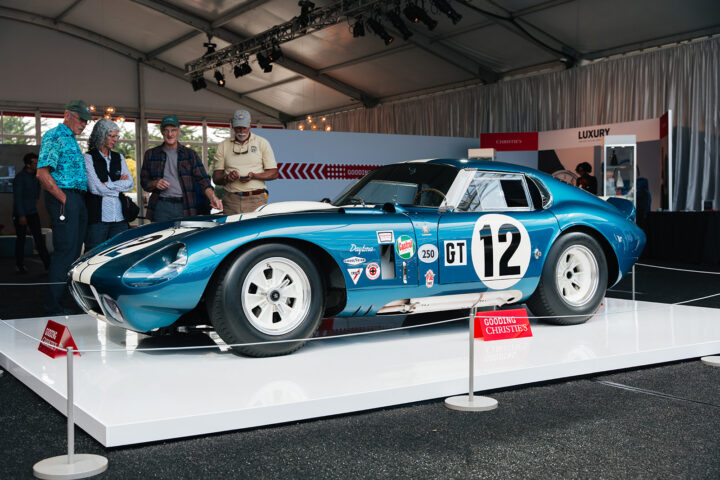 Carroll Shelby's own 1964 Cobra Daytona Coupe, CSX2300, sold for approximately $39 million at Pebble Beach, becoming the most expensive American car ever sold at auction.