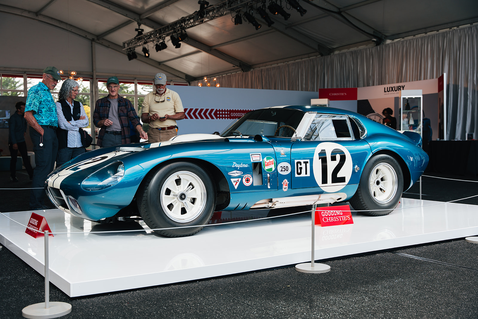 Carroll Shelby's own 1964 Cobra Daytona Coupe, CSX2300, sold for approximately $39 million at Pebble Beach, becoming the most expensive American car ever sold at auction.